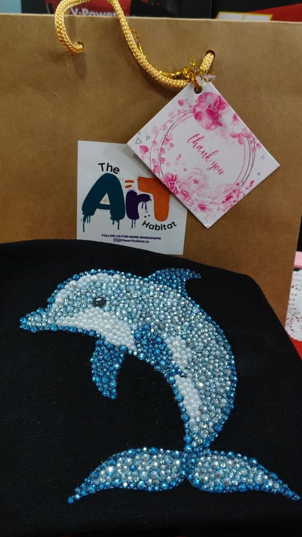 Bedazzled tote bag with dolphin design